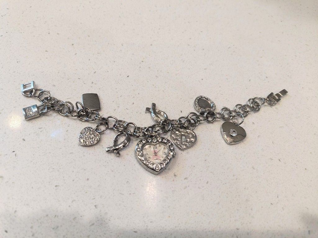 Quartz watch bracelet with charms