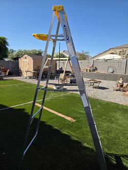 Werner 8 ft. Aluminum Step Ladder featuring a yellow holster top with tool slots