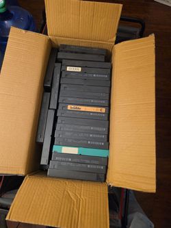 Lot of  65+ vhs tapes no covers . All random