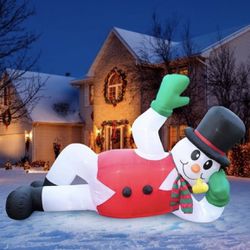10 ft Christmas Inflatable Lounging Snowman Yard Decoration - 10 ft Long Lawn Decoration, Bright Internal Lights, Built-in Fan, and Included Stakes an