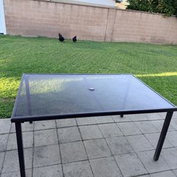 Used Glass Patio Table 38" x 60"