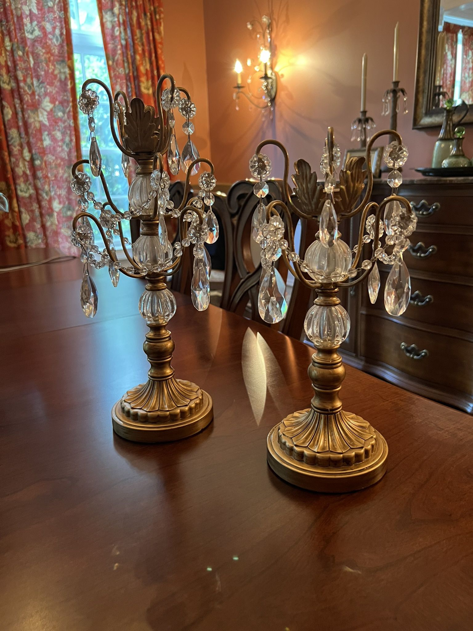 Glass and Gold Tone Candleholders in Excellent Condition One is 13”h the other 15”h. Smoke and pet free household.