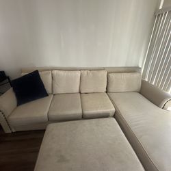 Large beige sectional couch