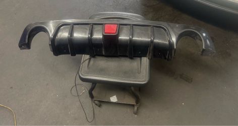 Bumper diffuser with light