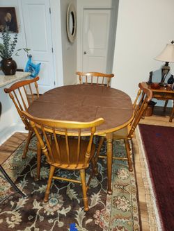 Table solid maple 53" wide oval.