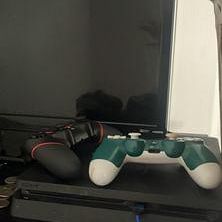Black PS4 With Two Controllers And Smart Tv