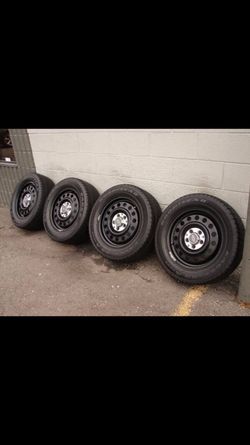 // 16" GM BLACK WHEELS AND GOODYEAR TIRES ]]