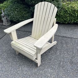 Yellow wooden Adirondack chair