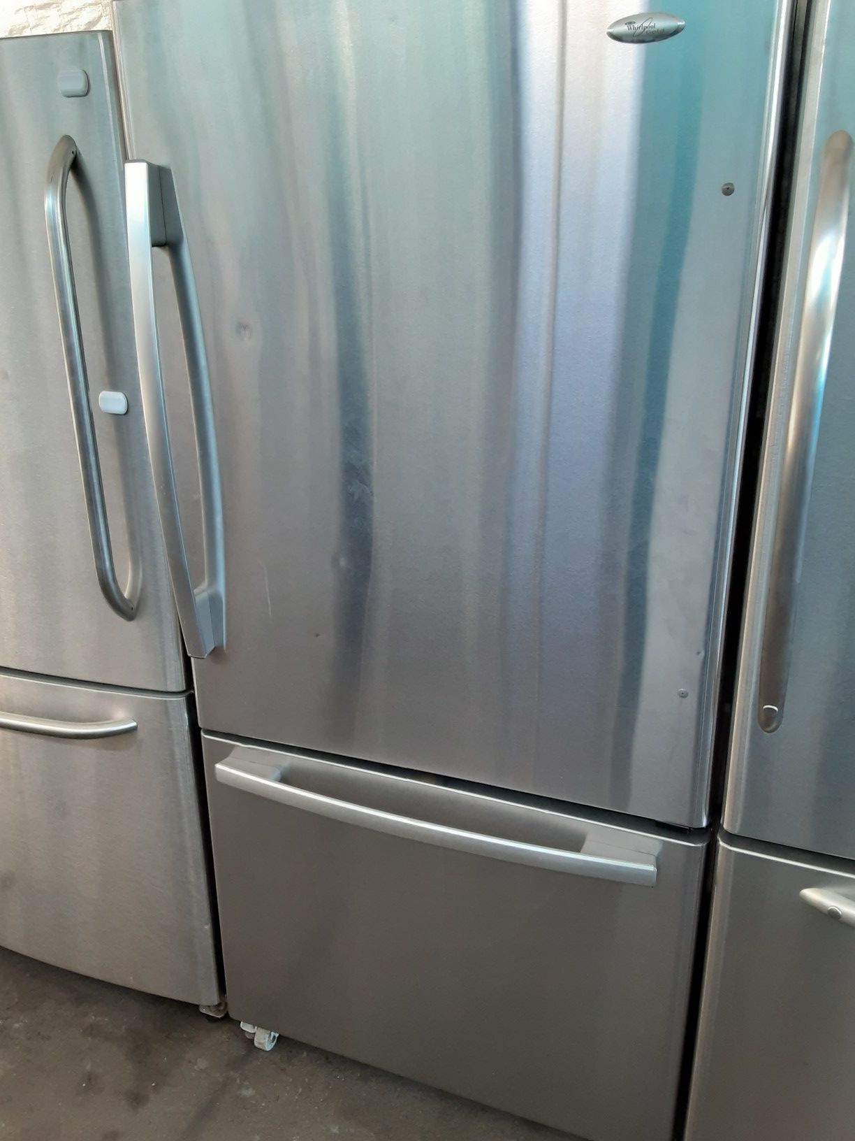 $399 Whirlpool stainless bottom freezer fridge includes delivering the San Fernando Valley a warranty and installation