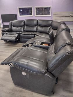 New power section on sofa with three power recliners on sale now don't miss