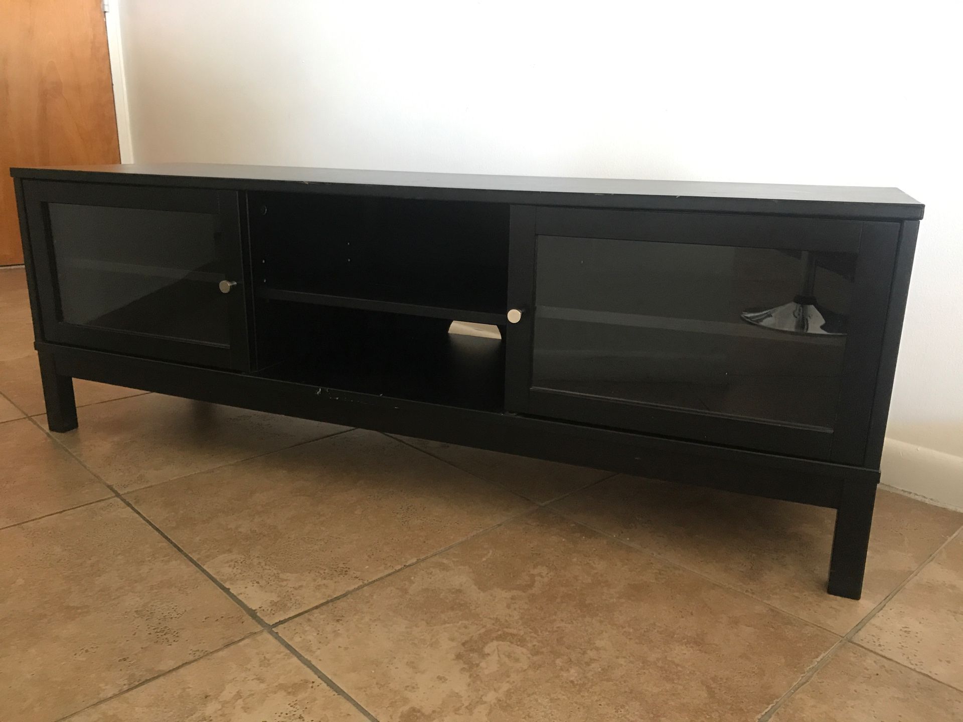 Tv stand with sliding doors