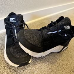 Sorel Women's Kinetic RNEGD Caribou Boot in the black/sea salt