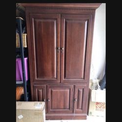 Armoire entertainment Center By Hooker Solid Wood. Original Price $2000