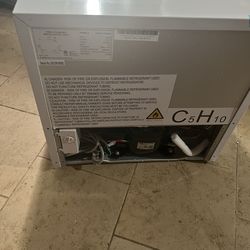 White mini fridge