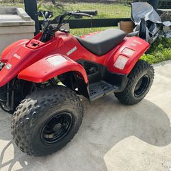 50cc Suzuki. Atv was running great but spark plug wire came off.