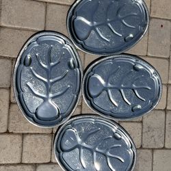 This vintage silver-plated meat serving  trays