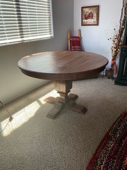 Round pedestal table 30” high 47” round