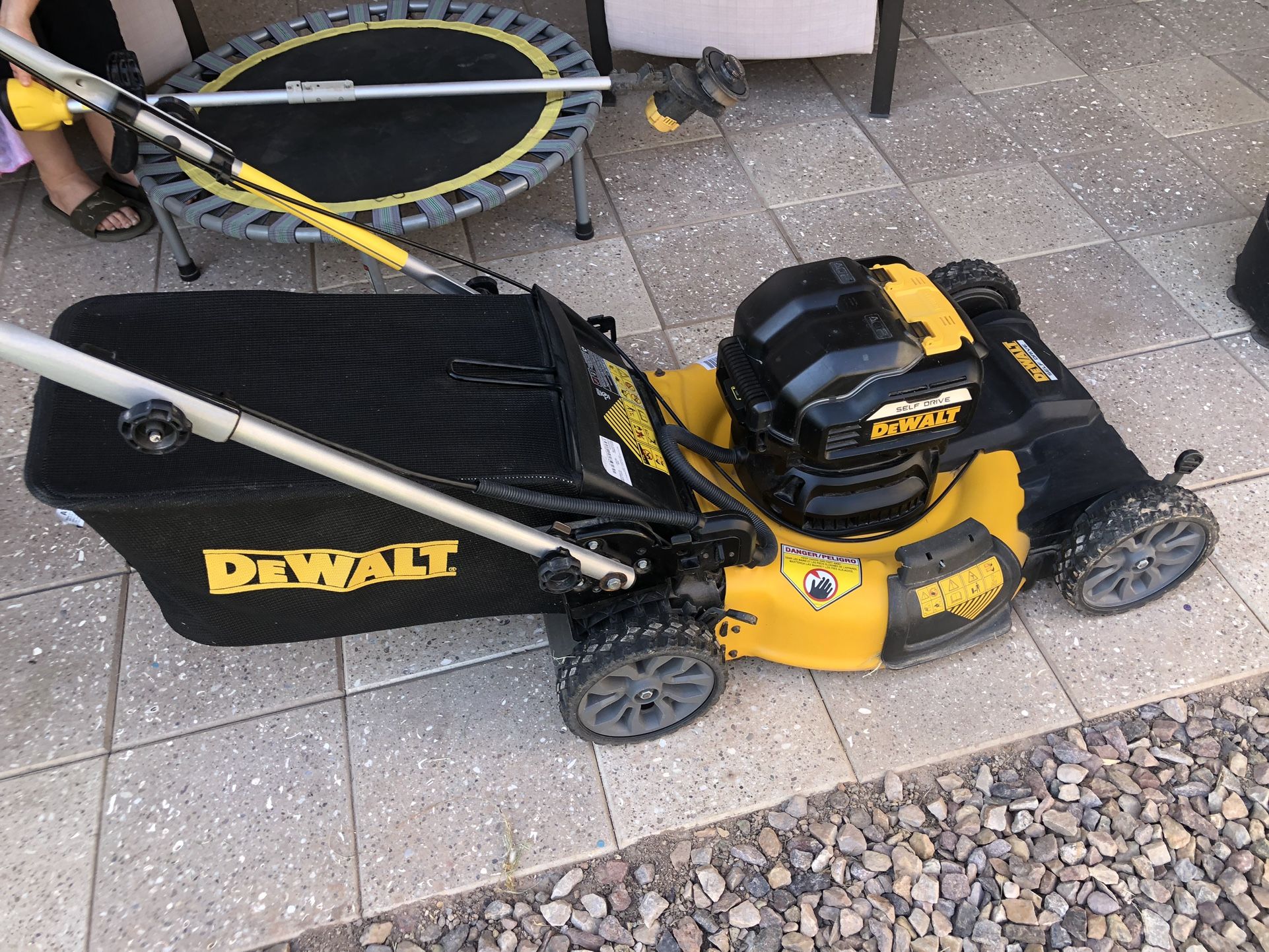 Dewalt Self Propelled Lawn Mower and Weed Eater.