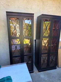 Pair of Black Glass Door Display Cabinets