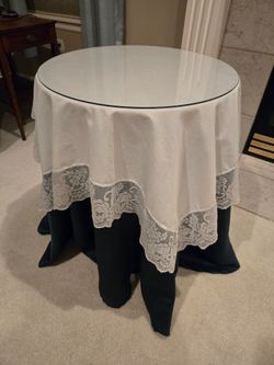 Round wooden Side Table with Glass Top and Linens