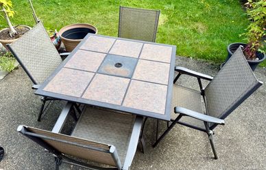 Patio set of square metal and tile table and 4 chairs