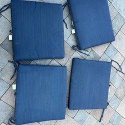 4 Piece Outdoor Patio Furniture Cushions in navy blue  Located in concord  Very good condition  No damages Covers not removable   Measures 17” x 19”  