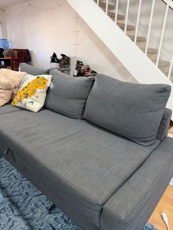 Gray Ikea pull put couch