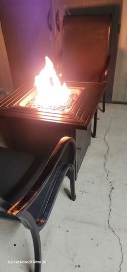 32" Propane Fire Pit with 2 tall back patio chairs in excellent condition firm price. 120 with chairs 80 without chairs