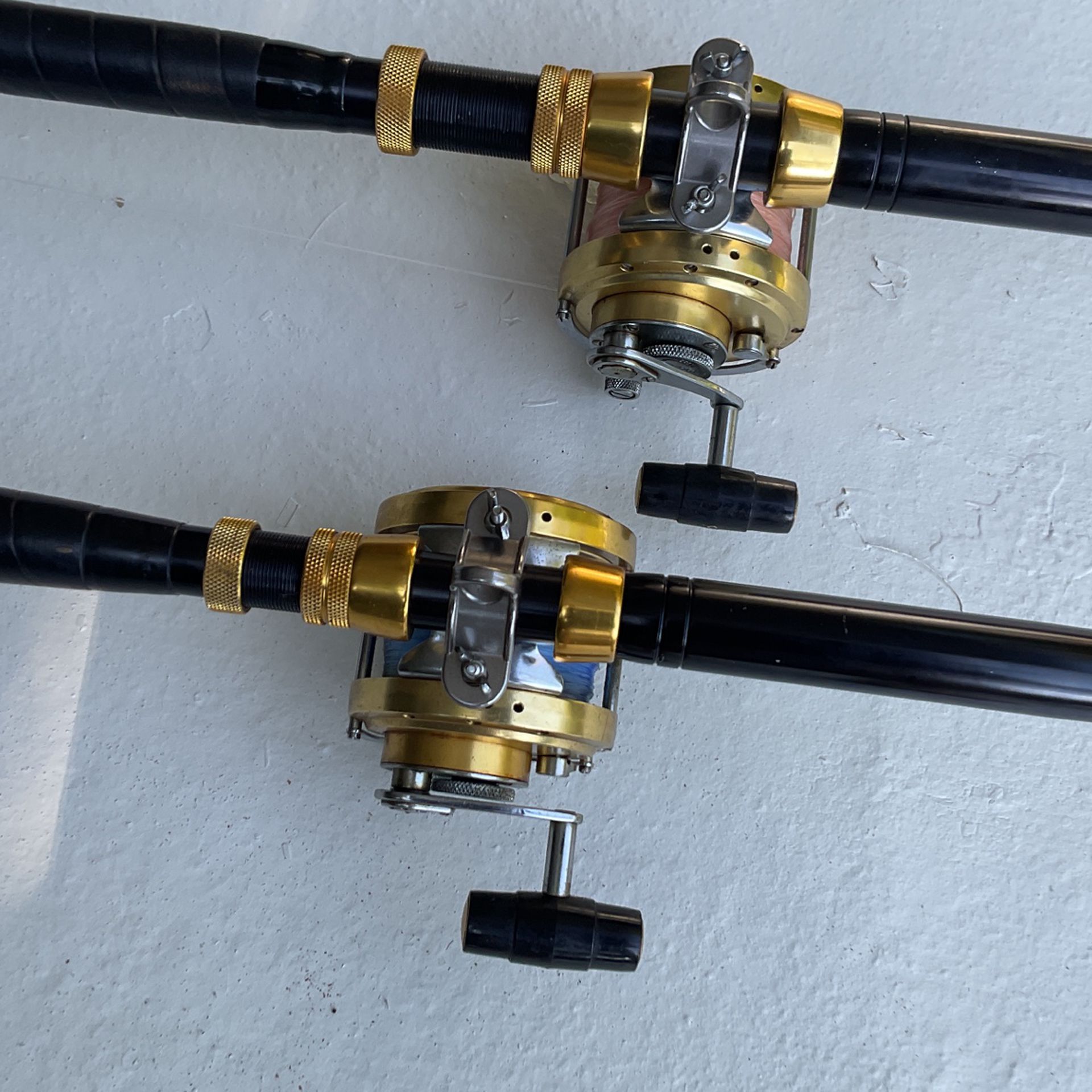 Two Penn International 50 Reels And 50lb And 80lb Class Rod And Reel Combos With line In Good Condition. Price Is for both.