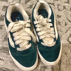 Green and white Vans Old Skool trainers 