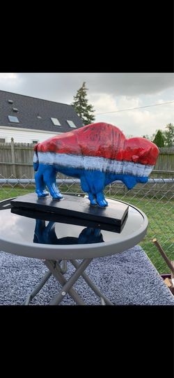 The red white and blue buffalo statue