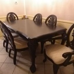 Dining room table and chairs.