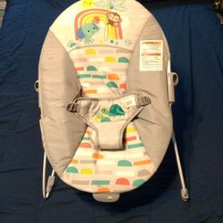 Bright Starts Playful Paradise Vibrating Baby Bouncer.