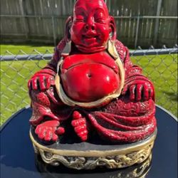 The red big belly Buddha