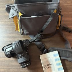 Minolta DYNAX Camera 303si  Japan with AF Zoom lens paperwork, case