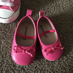 Pink baby flats size 6-9 months.