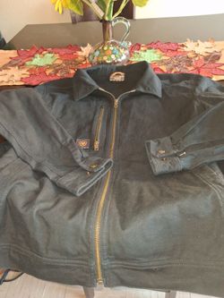 Chamarra ariat semi nueva