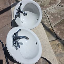 2 Bathroon Sinks And Moen Faucets