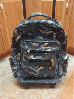 Dolphin rolling duffle bag with built in backpack