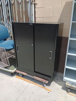 Vintage Mcdowell&Craig sliding door cabinet