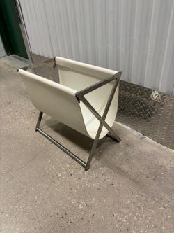 Leather & Chrome magazine rack , 20” wide , 11” depth , 17” high .. $30