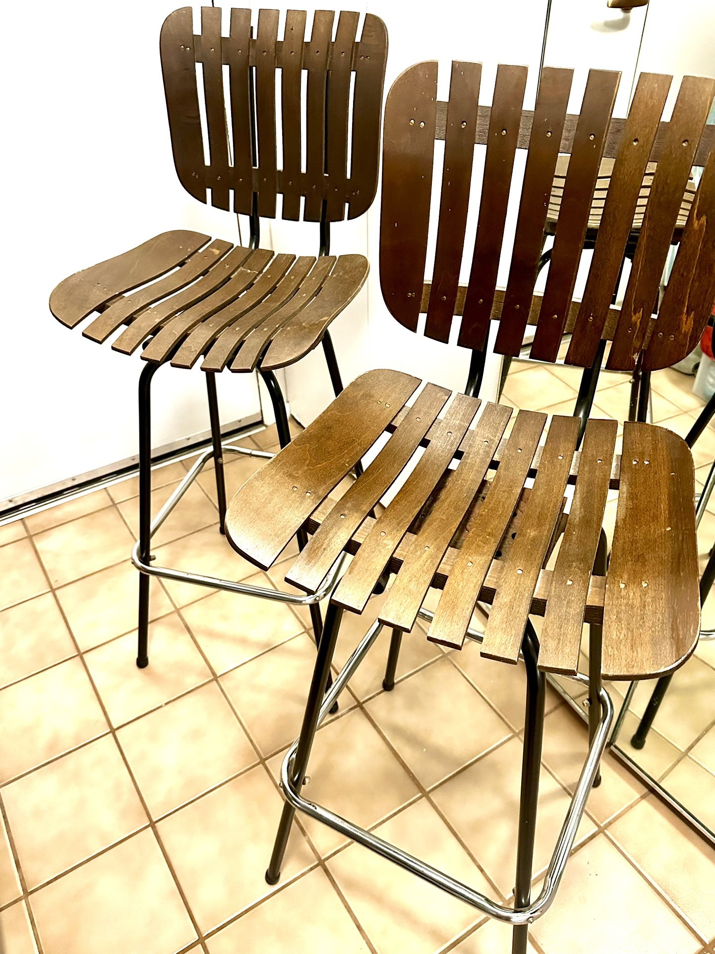 Arthur Umanoff mid 19th century swivel bar stool chairs.seen on the set of the series called Billions.