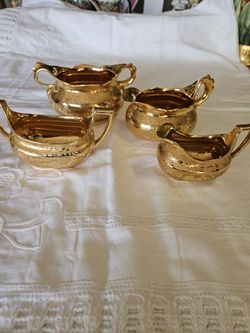 Vintage Stouffer gold plated china, sugar and creamer sets