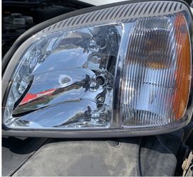 CADILLAC GENUINE FACTORY HEADLIGHT ASSEMBLY