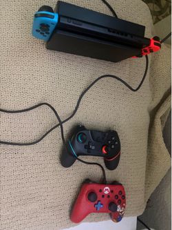 Nintendo Switch V2 Bundle – Dock, Joy-Cons, & 2 Controllers
