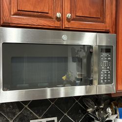 G&E over the counter microwave- new condition