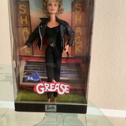 Beautiful Barbie! “Sandy, from Grease Movie”! 25 Years Collector Item. (Olivia Newton John, black leather outfit, new in Box).$40.00