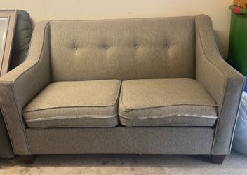 Grey love seat