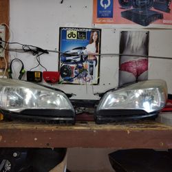 OEM. Front Headlights Ford Escape 2013-2016