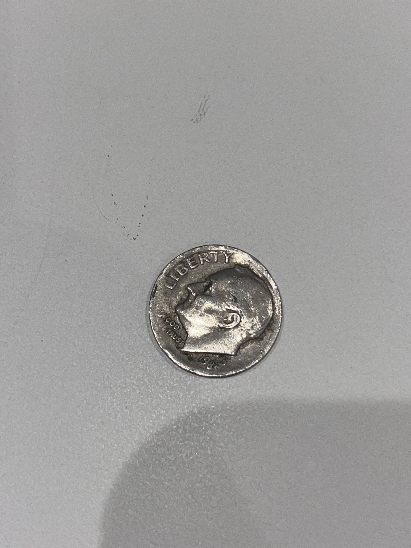 1985-D Error dime. Struck On Wrong Planchet. Off Center.